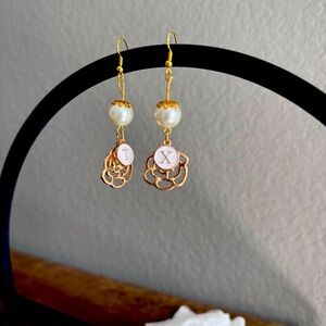 4 Pairs of Gold earrings